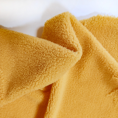 Warp Knitted Sherpa Fleece Fabric 100% Polyester Yellow Jacquard For Garment