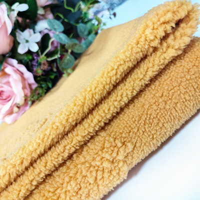 Warp Knitted Sherpa Fleece Fabric 100% Polyester Yellow Jacquard For Garment